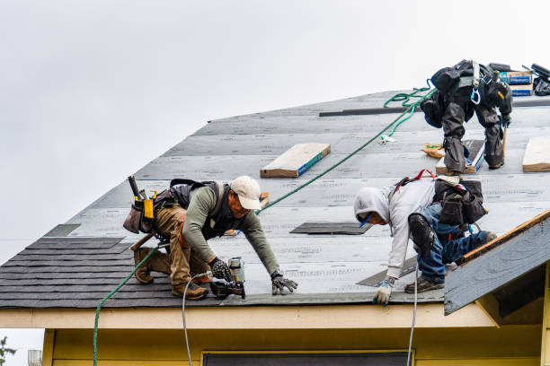 Professional Gutter Installation technician working in Kingston, NY